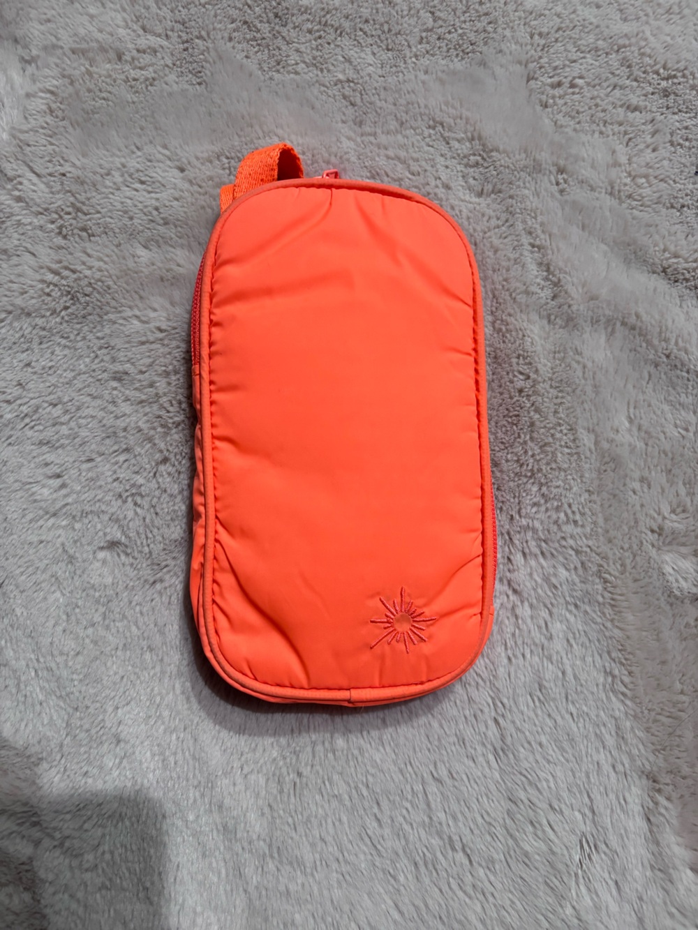 Compact Orange Cosmetic Pouch with Sunburst Stitching